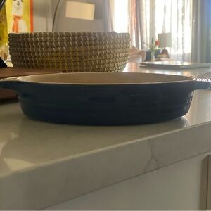 Le Creuset Oval au gratin dish .